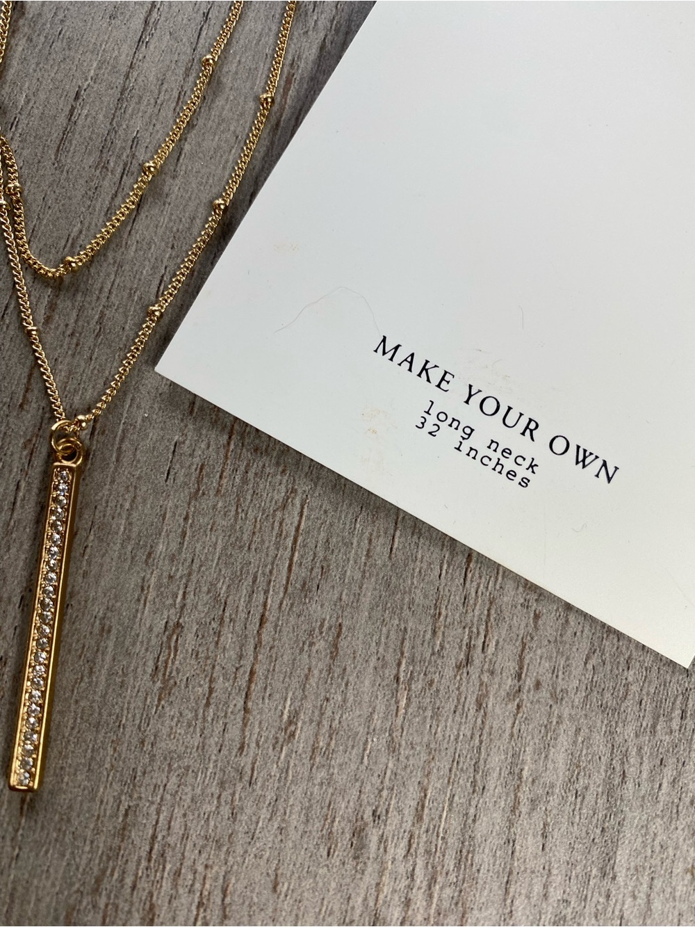 Gold Bar Pendant Necklace with Crystal Accents
